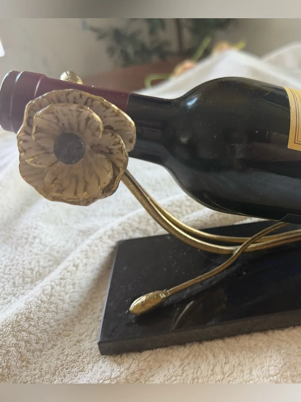 Michael Aram Gold Floral Wine Bottle Holder with Black Base and Burgundy Neck
